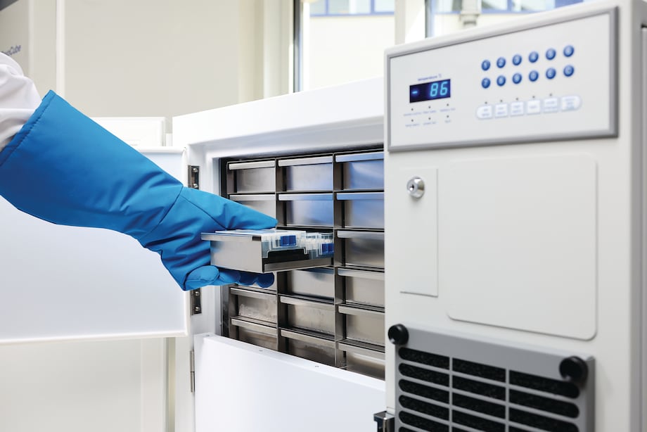 Scientist removing a sample box from an Eppendorf CryoCube_REG_ F101h ULT freezer