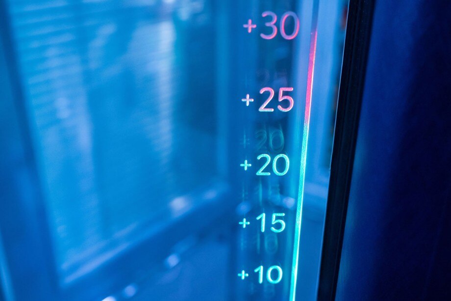Air quality and temperature affect lab ergonomics. Close-up of a thermometer to measure the temperature of the air that goes from 10 to 30 degrees Celsius.