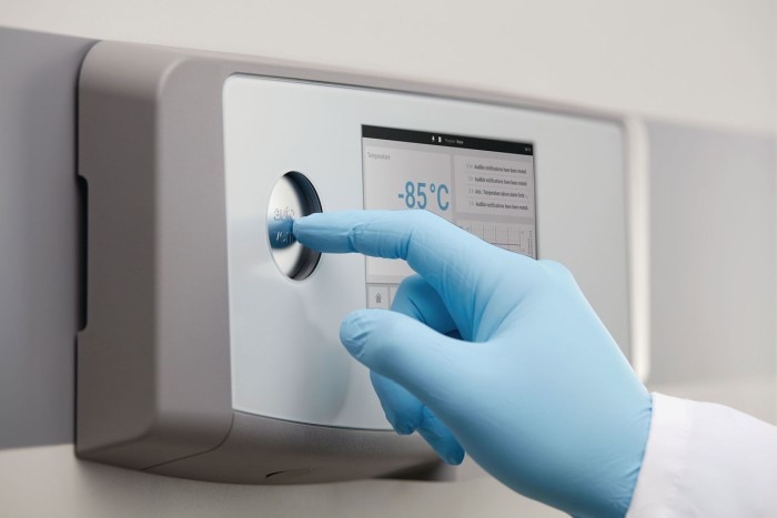 PhysioCare Concept® - Storage with ultra low temperature freezer Scientist uses the vent-port button of an ultra low temperature freezer to perform the pressure equalization.
