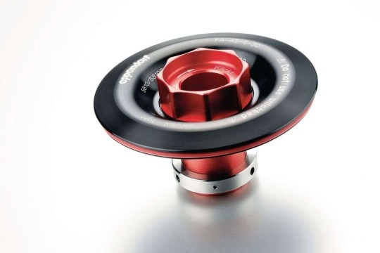 PhysioCare Concept® - Centrifuges A black centrifuge rotor lid with a red knob symbolizing aerosol-tightness.