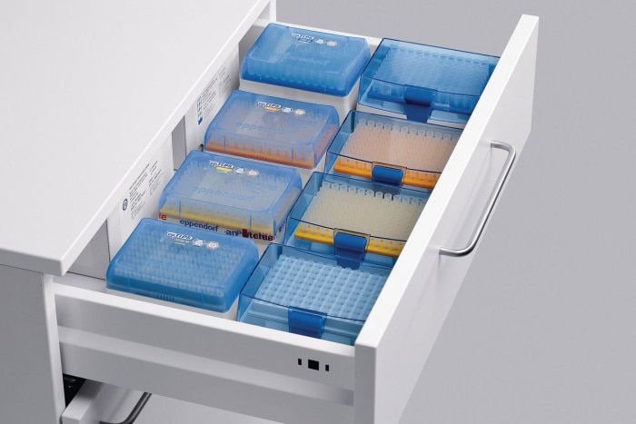 Comfortable handle for your pipette carousel. A drawer full of tip boxes for different volume class pipettes, symbolized by different colors.