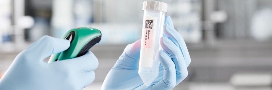 PhysioCare Concept® - Tubes Datamatrix code of lab tube is scanned by a scientist.