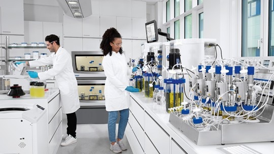 Bioprocess systems for scaling up microbial production