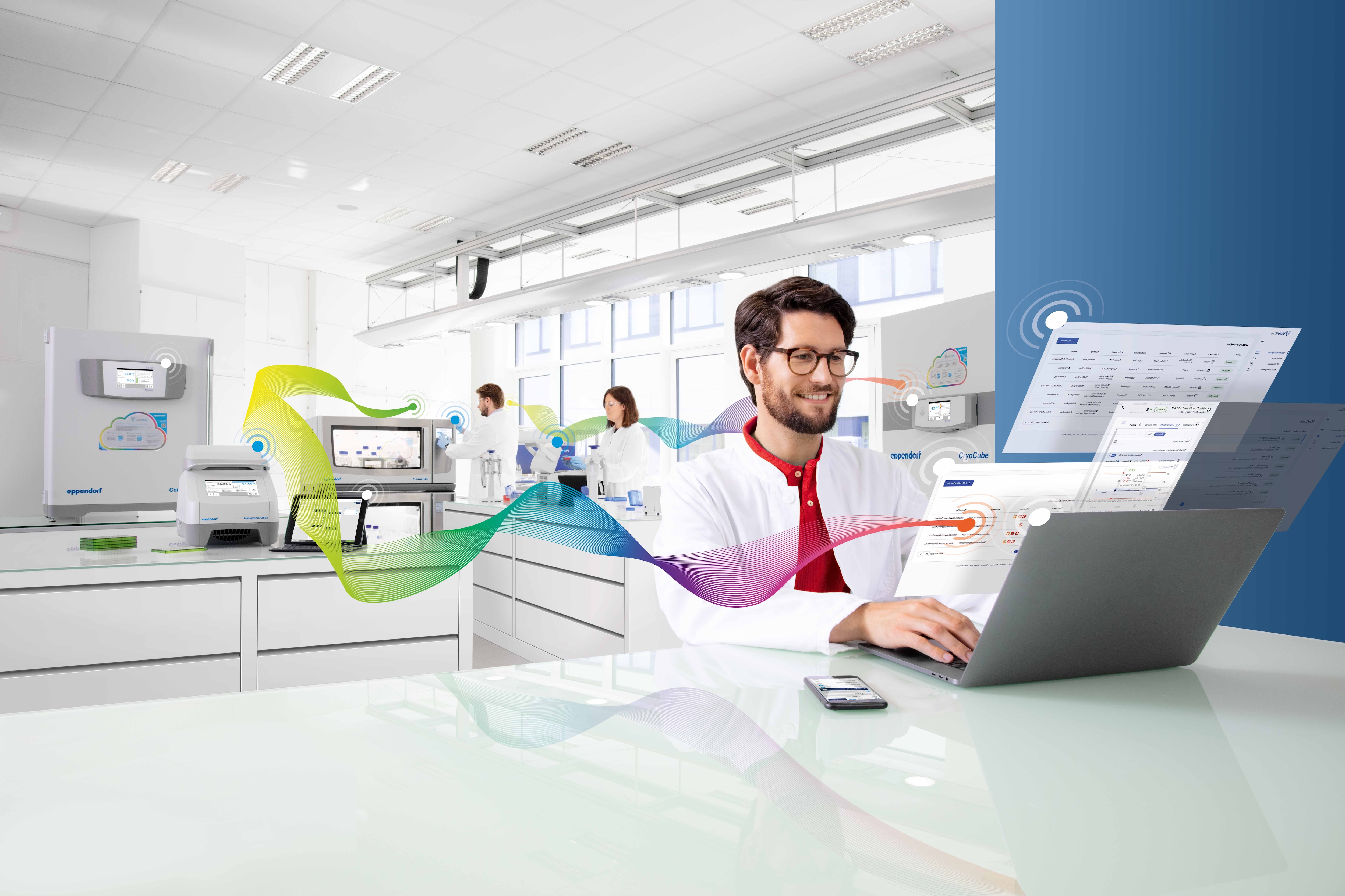 Man at the bench using the lab management software to control the intelligent lab