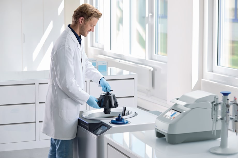 Centrifuge CP100NX, lab scene man with rotor