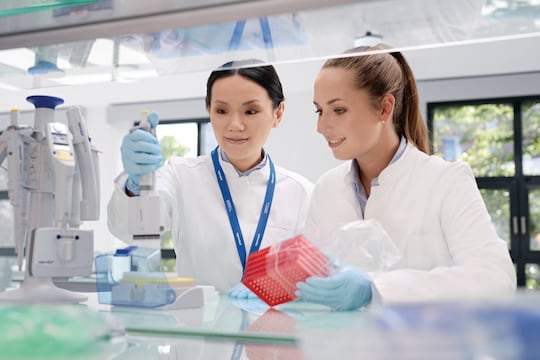 Two Female Scientists Working with Eppendorf Research_REG_ plus 16-channel Pipette and Eppendorf twin.tec_REG_ PCR Plates