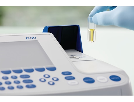 Scientist working with Eppendorf Spectrophotometer