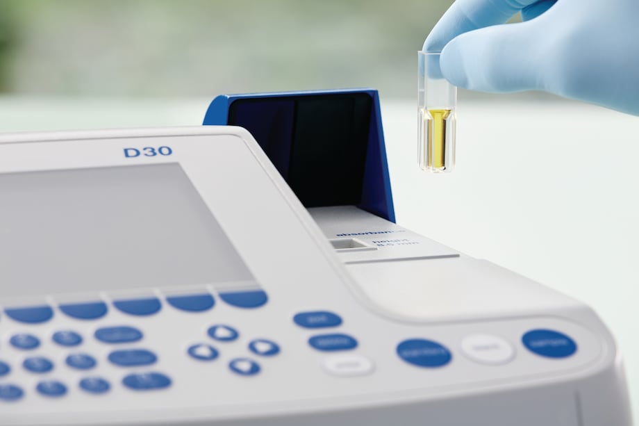 BioPhotometer with Vis Cuvette Scientist working with Eppendorf Spectrophotometer