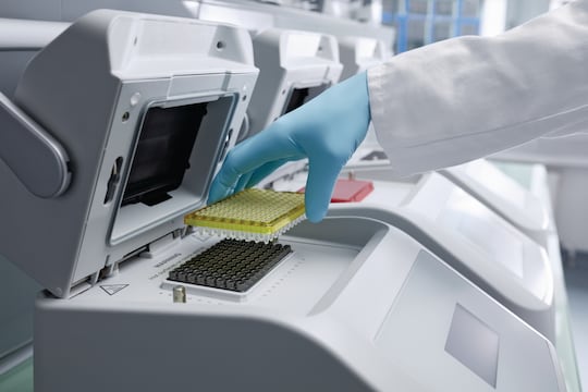Scientist loading samples into Mastercycler® X50 eco unit