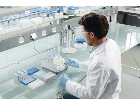 Lab scientist changes settings of Eppendorf MixMate instrument