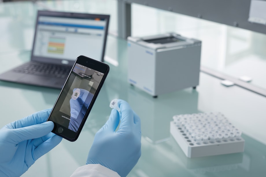 Scanning Eppendorf SafeCode ID on tube with mobile phone Eppendorf RackScan B with eLabNext app to scan and document lab samples for longterm storage
