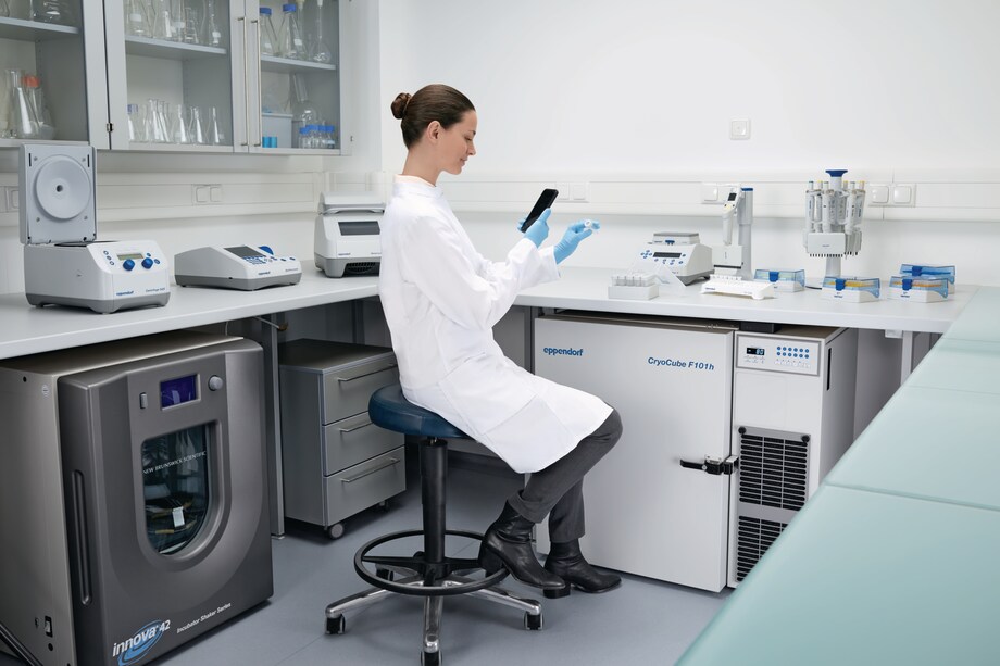 Eppendorf CryoCube F101h ULT freezer: Part of the lab Eppendorf CryoCube_REG_ F101h ULT freezer with person scanning tube for documentation and finally storage