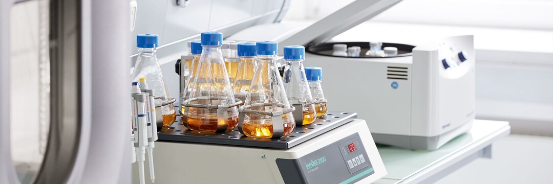 Innova 2000 Bottles with samples on the platform of Eppendorf's shaker Innova 2100