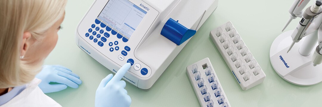 Eppendorf photometer at the bench Female scientist using a BioSpectrometer photometer